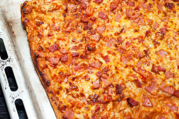 Freshly Baked and Hot Pizza on a Sheet Pan.