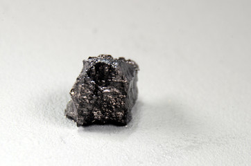 Closeup on a small piece of Boron (B)