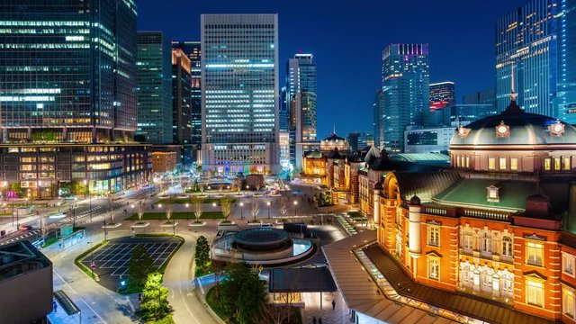 time lapse of night scene of Tokyo Station in the Marunouchi business district, Tokyo, Japan
