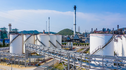 Fototapeta na wymiar Aerial view storage tank and tanker truck in industrial plant, Chemical Industry.