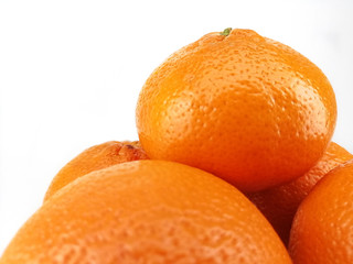 sweet juicy bright tangerines on a white background