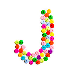 Letter J of the English alphabet made of multi-colored buttons