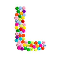 Letter L of the English alphabet made of multi-colored buttons