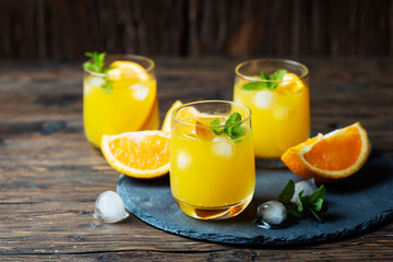 Fresh summer cocktail with orange and mint