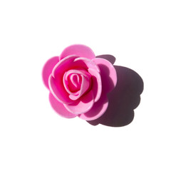 Artificial pink rose isolated on white background. Flat-lay, overview, holiday, Valentines Day concept