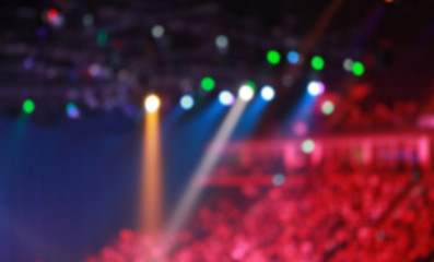 Obraz na płótnie Canvas Blurred Concert light with colored spotlights and smoke.