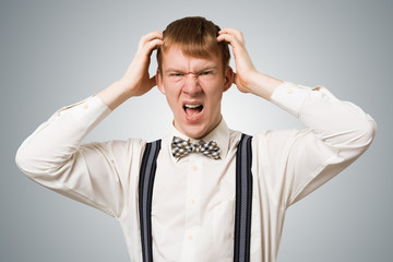 Stressful hipster screaming with panic