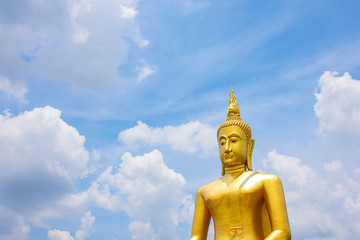 Fototapeta premium Big Buddha golden Background of sky and clouds at Wat Bang Chak in Nonthaburi , Thailand.