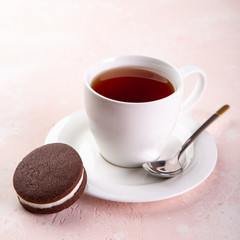 cup of tea and homemade chocolate sandwich cookies