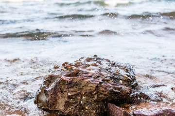 Impacting rocks on the coast,Rock by the sea