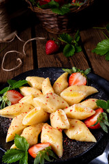 Kopytka - polish potato dumpling with strawberries