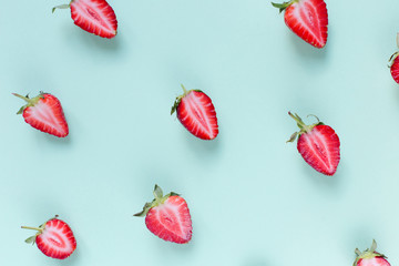 green background with fresh Strawberry halves