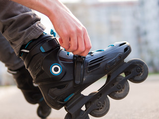 Fototapeta na wymiar Close-up of dressing roller skates