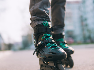 Roller skates close-up with copyspace. Roller skating in the city, freeride