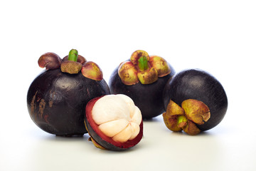 Asian tropical mangosteen fruit on white background