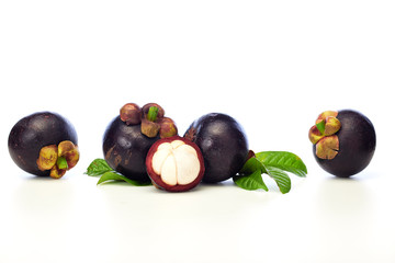 Asian tropical mangosteen fruit on white background