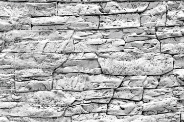 Modern black and white stone wall texture background.