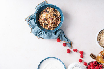 Granola breakfast in ceramic bowl