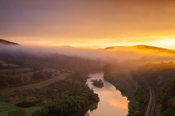 View from the hill into the valley with the Berounka river.