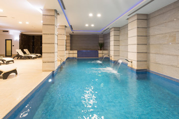Swimming pool in hotel spa and wellness center