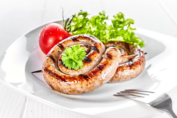 Serving with two portions of grilled beef sausage