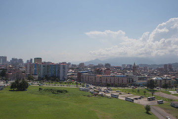Fototapeta na wymiar view to Batumi Town at Georgia. General view of the city from the viewpoint. Batumi, Georgia. Sunny Summer Day With Blue Sky Over Street