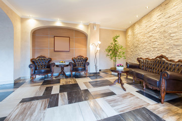 Interior of a hotel lounge with leather furniture