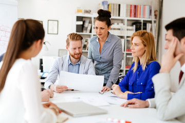 Obraz premium Group of business people working as team in office