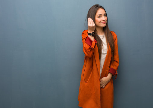 Young Natural Woman Doing A Typical Italian Gesture