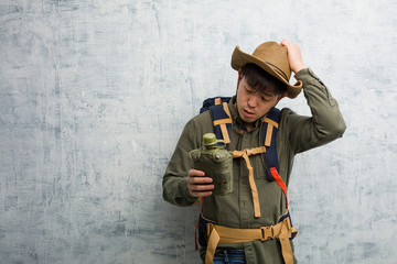 Young explorer chinese man worried and overwhelmed