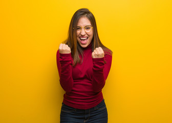 Fototapeta premium Young intellectual woman surprised and shocked