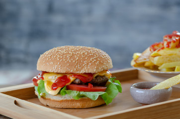 Homemade hamburger and potato fries.
