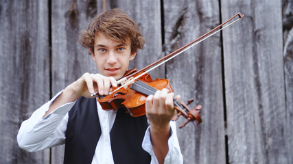 Young retro violin musician portrait