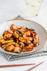 Chinese meal Chicken with Oyster sauce in ceramic plate on a table.