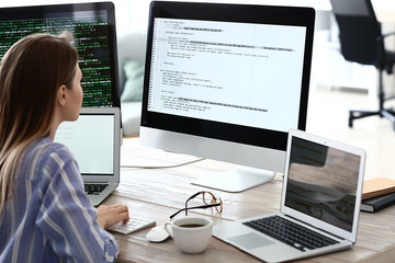 Female programmer working in office