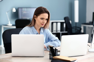 Female programmer working in office