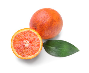 Tasty blood oranges on white background