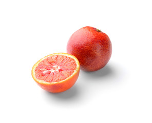 Tasty blood oranges on white background