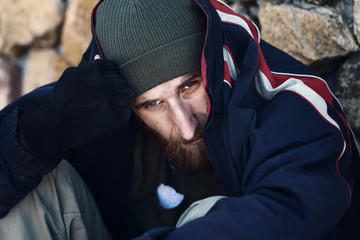 Poor homeless man outdoors