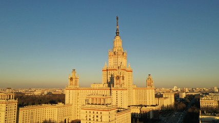 Fototapeta premium Aerial view of Stalin's skyscraper, Moscow University on sunset in spring. Moscow river. Russia. Bird’s view point.