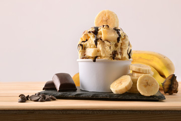 Banana ice cream cup decorated with chocolate © Davizro Photography