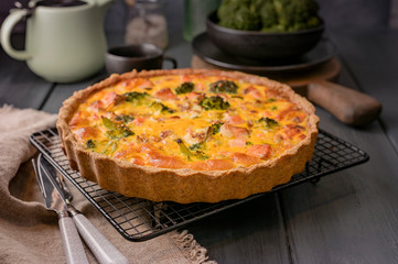 Traditional broccoli pie with salmon and cheese. Food from healthy and healthy foods. Lunch.