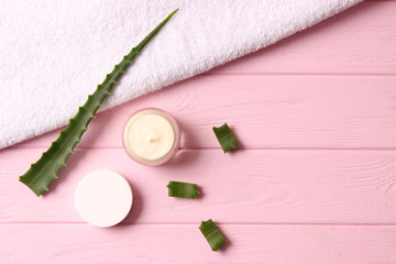 cream with aloe vera on a light background. Aloe vera skin care. Moisturizing and skin care.
