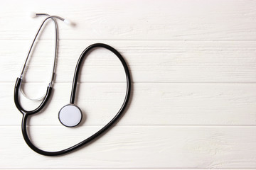 stethoscope on color background. Health, medicine