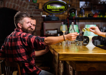 Purchase and payment. Cash money concept. Leave tips for bartender. Tip given to waiter. One more alcohol cocktail. Man hold dollar money cash at bar counter. Cash payment. Ordering drinks in bar
