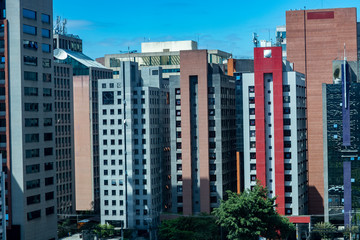 Fototapeta premium View at modern courtyard. Facade of modern building. Sao Paulo city, Brazil. South America. 