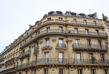 Fototapeta na wymiar Architecture of Paris France. Facades of a traditional apartment buildings