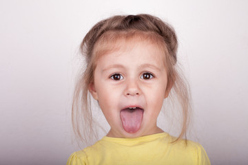 Little girl showing her tongue © Stanislaw Mikulski