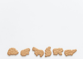 Baby cookies animals fun food snack for kids on a white background. Proper children food. Homemade cooking. Safe food.