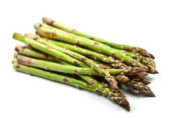 Bunch of fresh raw garden asparagus isolated on white background. Green spring vegetables.
